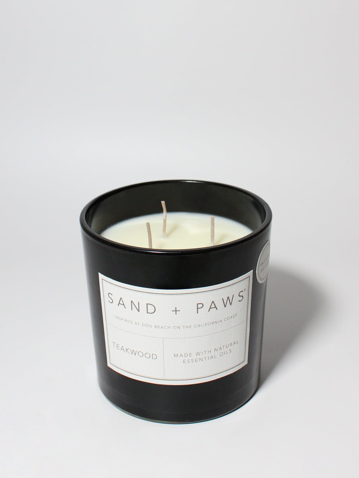 Aromatic Sand + Paws Teakwood 21 oz scented candle